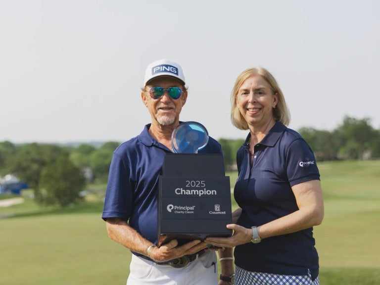 Deanna Strable with the Principal Charity Golf Classic champion, Miguel Angel Jimenez