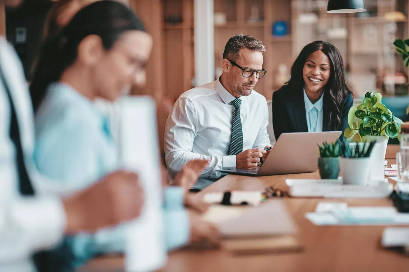 Young professionals in a low-key office setting