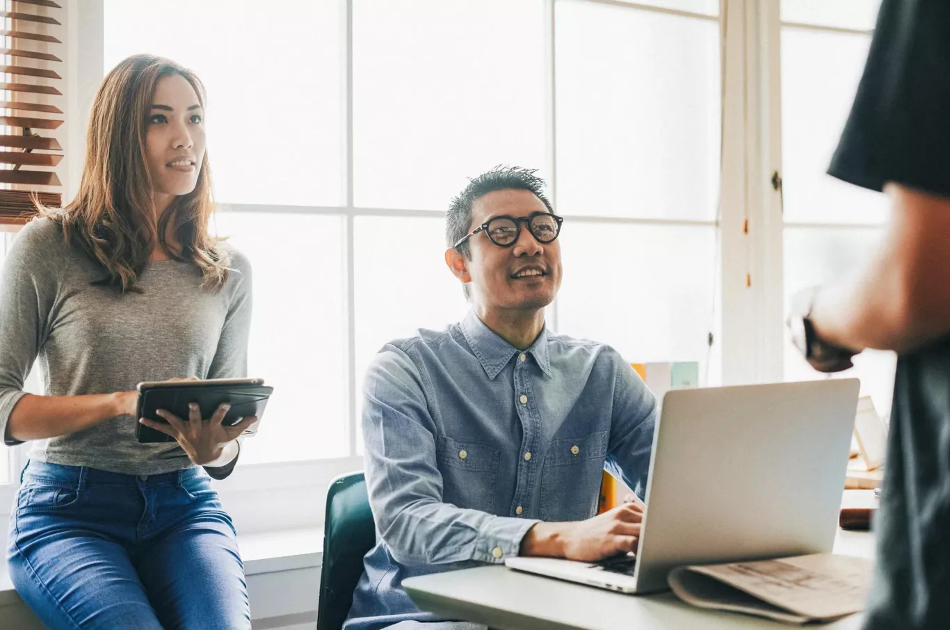 Young professionals in a low-key office setting