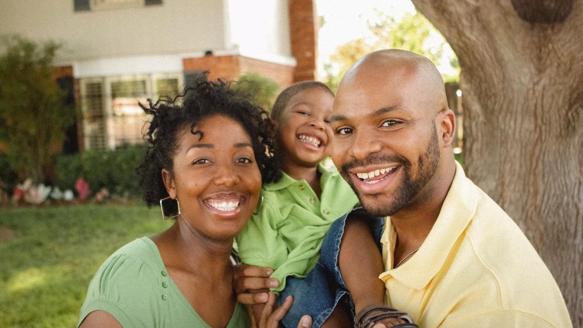 A happy family enjoying time outside.