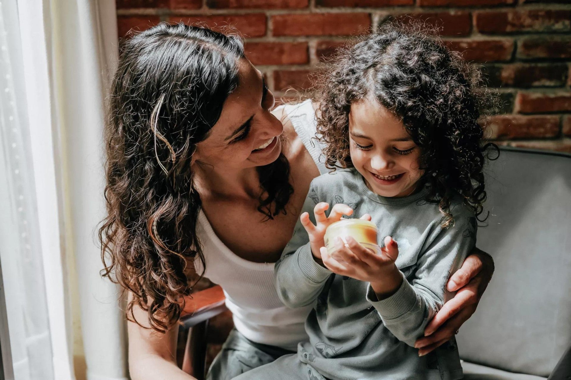 Woman with her young daughter.