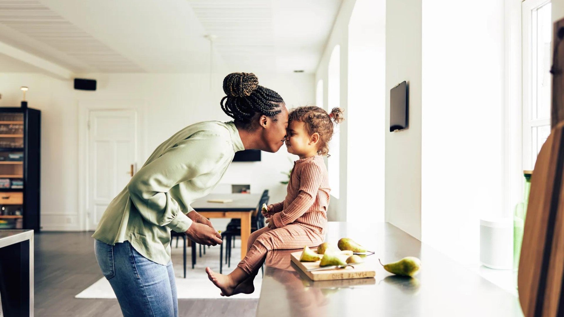 Mom and young child playing